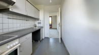 Küche - 2-Zimmer-Dachgeschoss-Wohnung mit zwei Terrassen und Tiefgaragenstellplatz