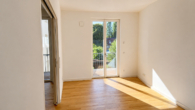 06_Zimmer_mit_Loggiazugang_ARGUS - Großzügige Stadtwohnung mit Loggia, Balkon und langfristigem Wohnkomfort
