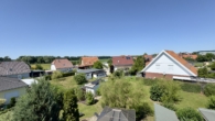 Ausblick aus dem Dachgeschoss - Modernisiertes Haus mit Traumgarten & zusätzlichem Baulandpotenzial