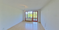 Wohnzimmer P1 - Wohnen wie im Reihenhaus – mit Terrasse, Souterrain und Grünblick