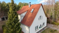Blick auf das Haus - Gepflegtes Einfamilienhaus mit Nebengelass und Garage am Wald in Borkheide